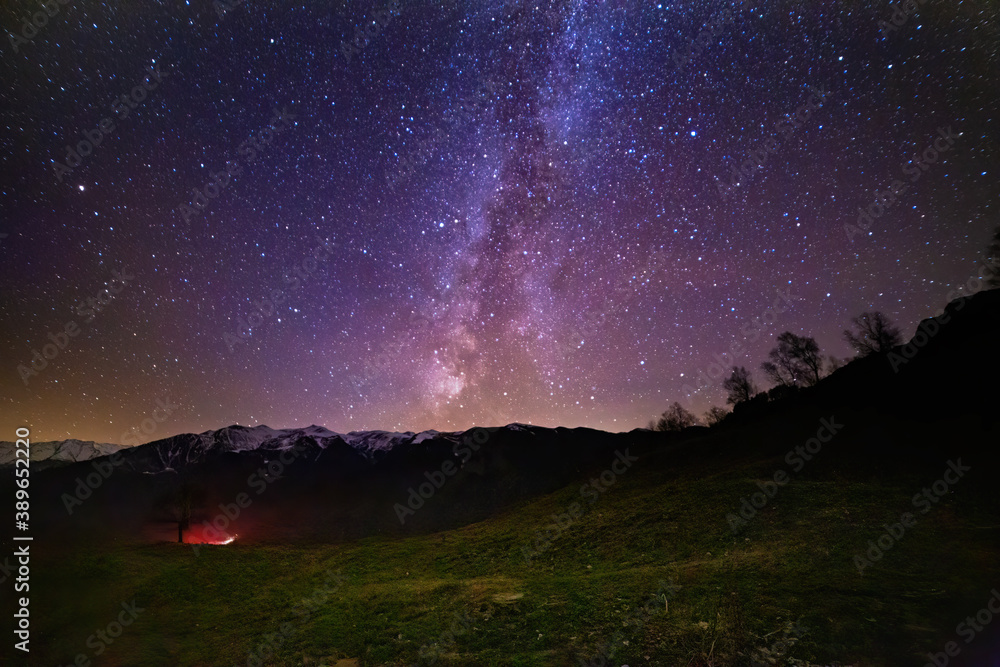 Milky Way Galaxy with stars and mountain landscape