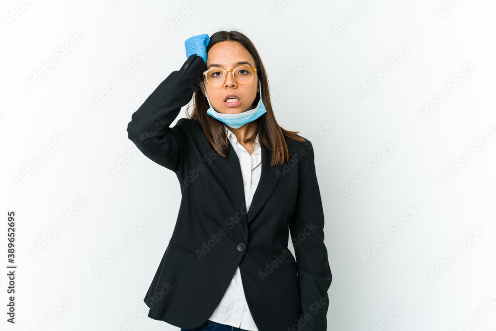 Young business latin woman wearing a mask to protect from covid isolated on white background tired and very sleepy keeping hand on head. Young business latin woman wearing a mask to protect from covid isolated on white background tired and very sleepy keeping hand on head.