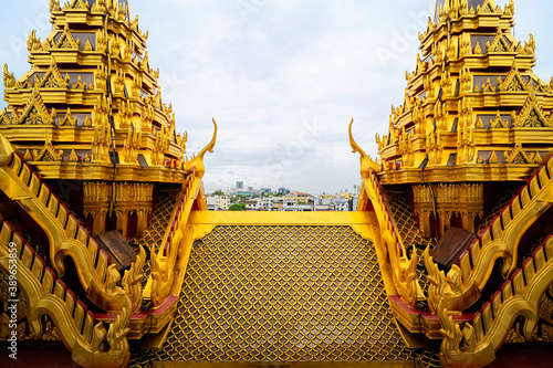 Metal castle with roofs made of metal in Wat Ratchanatda(Temple in Bangkok, Thailand) photo