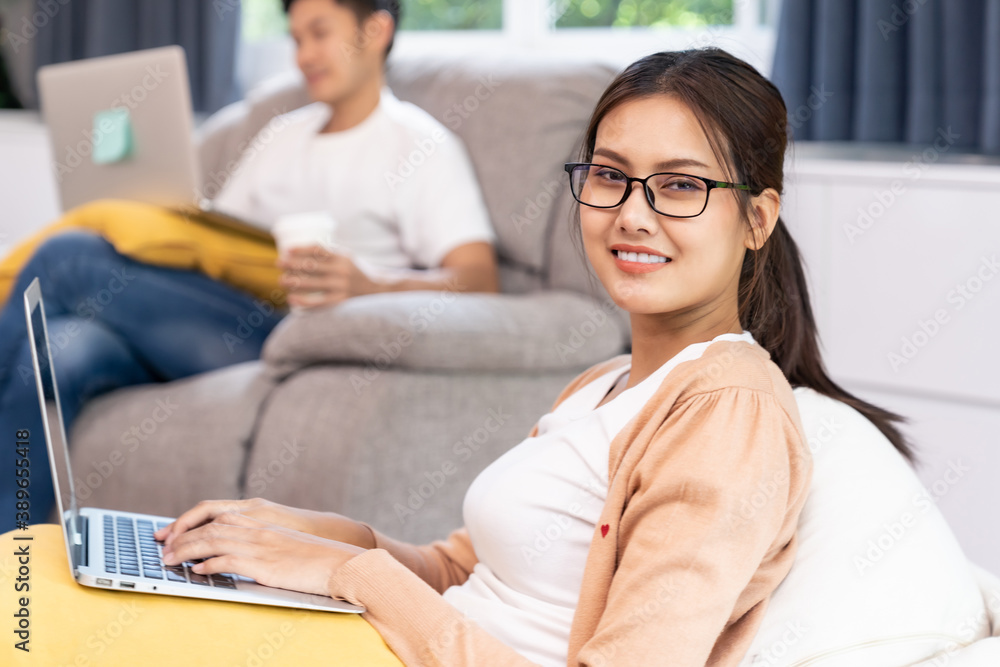 Quarantine couple working from home with laptop Quarantine couple working from home with laptop