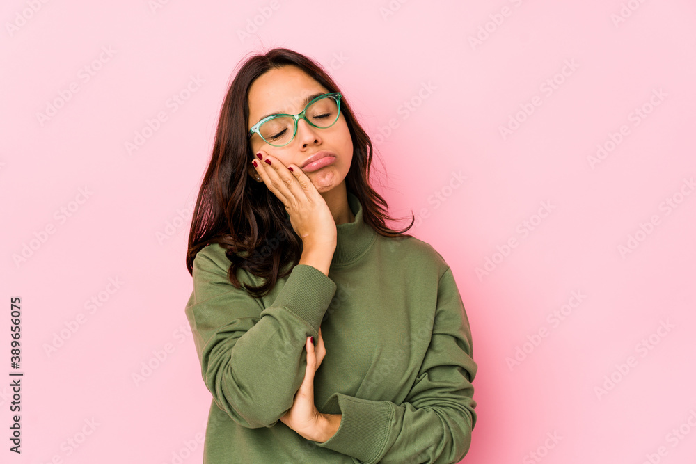 Young mixed race hispanic woman isolated who is bored, fatigued and need a relax day.