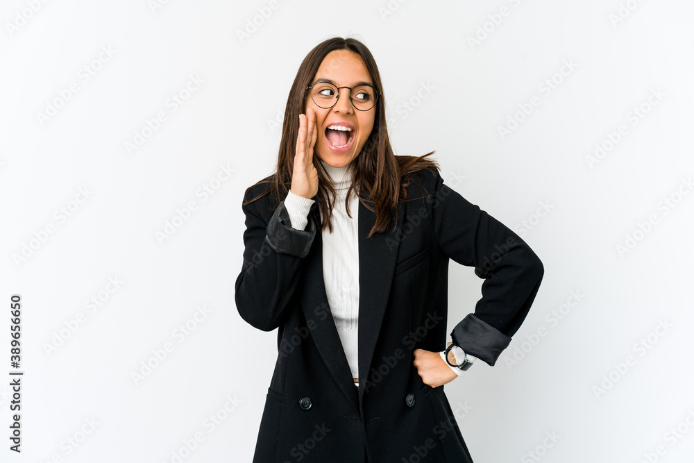 Young mixed race business woman isolated on white background shouting excited to front. Young mixed race business woman isolated on white background shouting excited to front.
