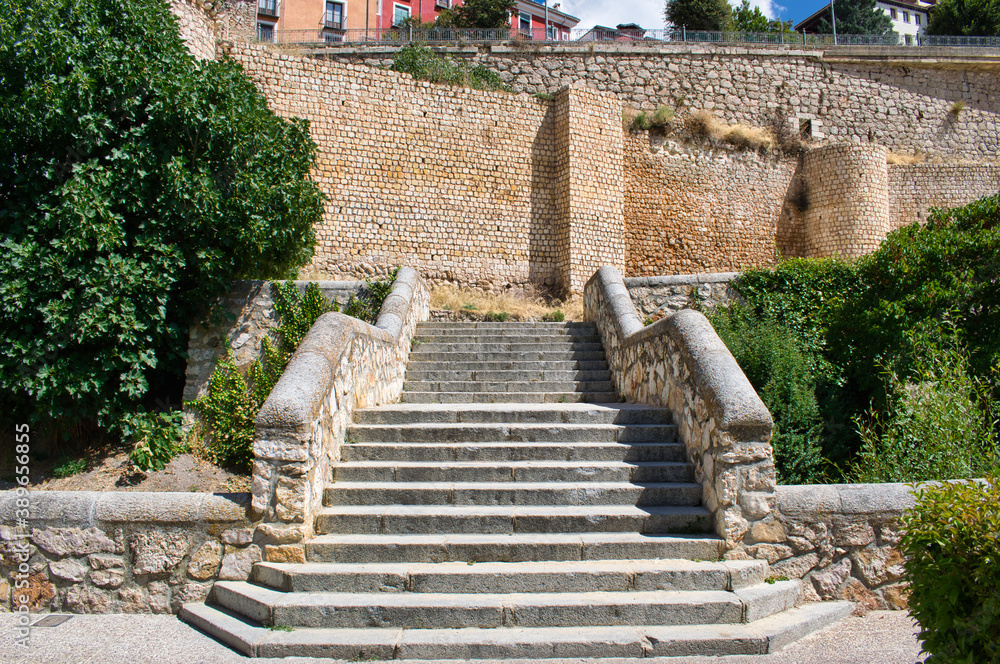 Stairs and bridge over the Huecar river with the walls of Cuenca dating from the 10th and 11th century Muslim era