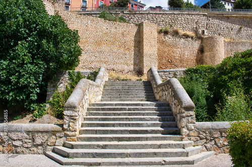 Stairs and bridge over the Huecar river with the walls of Cuenca dating from the 10th and 11th century Muslim era photo