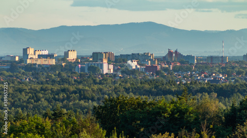 Panorama of the city of Tychy in Silesia. View of the mountains over the city buildings. © spacer.z.aparatem 