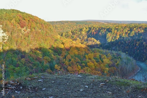 View of the Genesee River in Letchworth State Park in Castile, New York, during foliage season in autumn photo