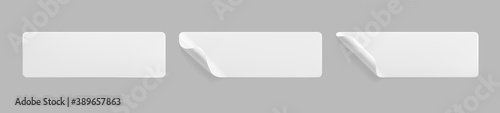 White glued rectangle stickers with curled corners mock up set. Blank white adhesive paper or plastic sticker label with wrinkled and creased effect. Template label tags close up. 3d realistic vector