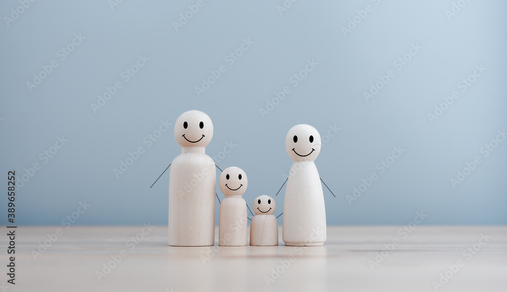 wooden doll family happy face, family home, adoption foster care, homeless support , family mental health, domestic violence, social distancing