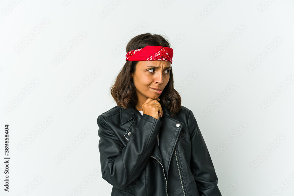 Young latin rocker woman isolated on white background Young latin rocker woman isolated on white background