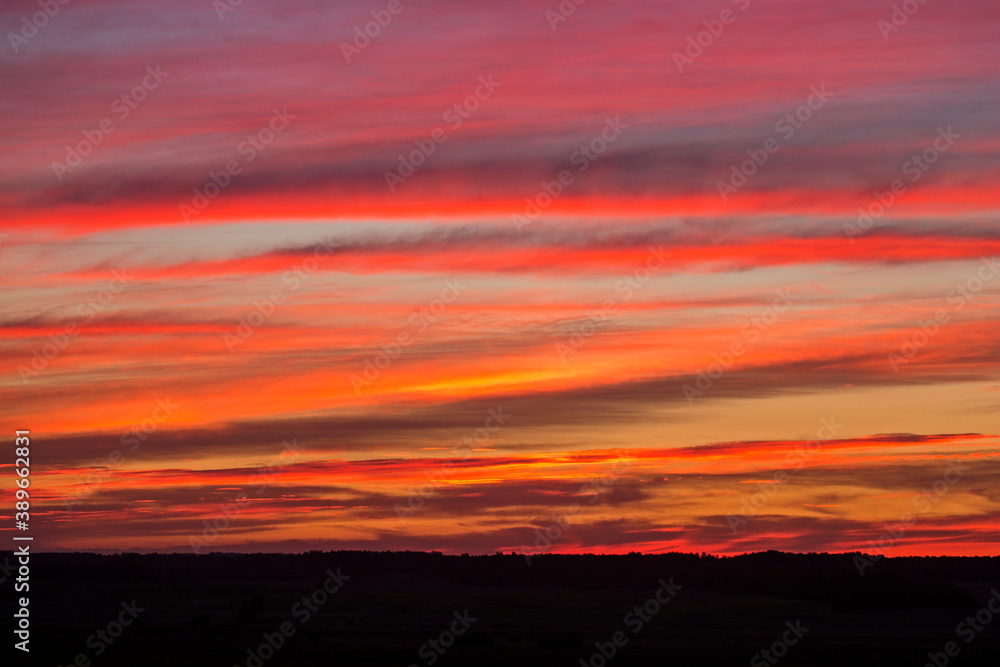 Dramatic sky over the fields. Agricultural landscape in eastern Lithuania. Dramatic sky over the fields. Agricultural landscape in eastern Lithuania.