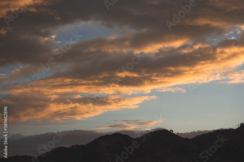 sunset with red clouds from a clear sky © Juan Carlos 