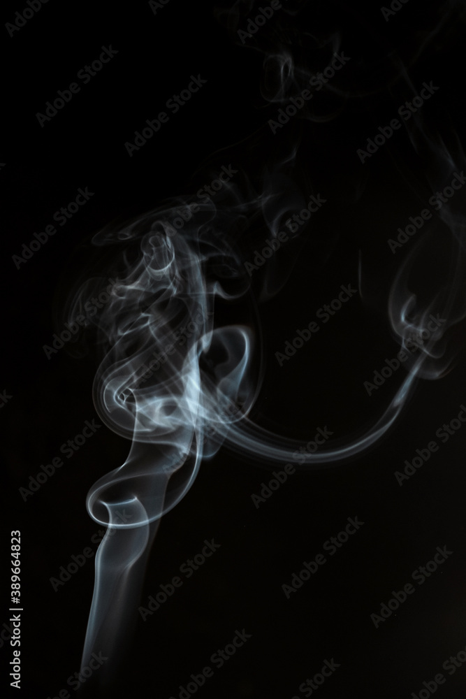 Abstract shape smoke in motion on a black background Abstract shape smoke in motion on a black background