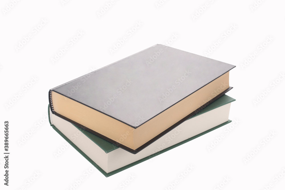 two books piled and isolated on white background with clipping path and copy space for your text two books piled and isolated on white background with clipping path and copy space for your text