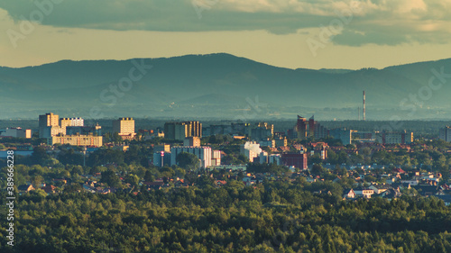 Panorama of the city of Tychy in Silesia. View of the mountains over the city buildings.