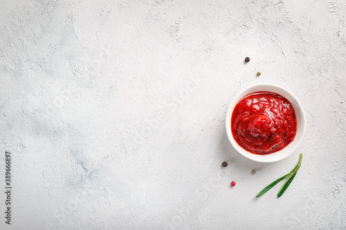 Tasty tomato sauce in small bowl