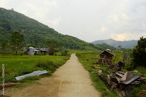 Dirt rural road in small vietnamese village in the mountains  Vietnam  September  2015