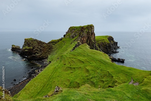 Landscape of legendary Rubha nam Brathairean (Brothers Point) in Isle of Skye in Scotland with unusual shape of hills