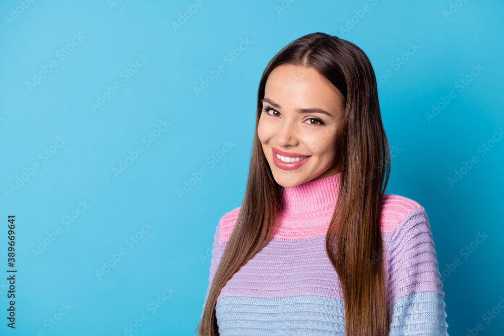 Turned photo of lovely girl look in camera toothy smile wear pullover isolated blue color background Turned photo of lovely girl look in camera toothy smile wear pullover isolated blue color background