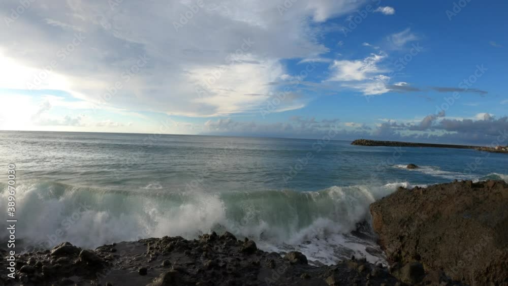 Giant waves crashing on a rock slow motion Martinique tropical beach Grand Riviere village Giant waves crashing on a rock slow motion Martinique tropical beach Grand Riviere village
