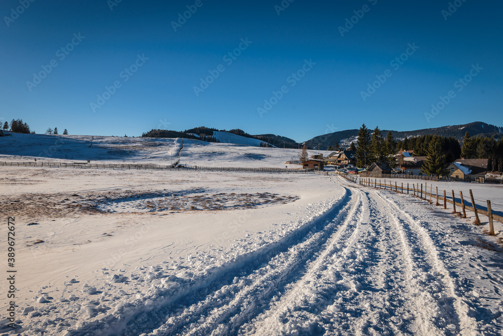 Sunny winter scenery with  snow-covered nature, and snowy alpine road in Steiermark Austria. Austria. December winter landscape.