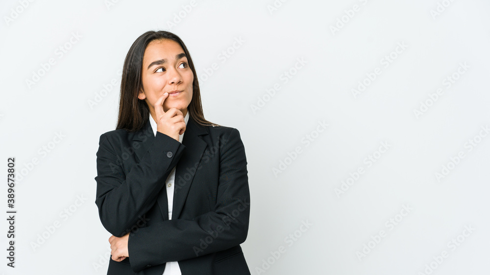 Young asian bussines woman isolated on white background looking sideways with doubtful and skeptical expression. Young asian bussines woman isolated on white background looking sideways with doubtful and skeptical expression.