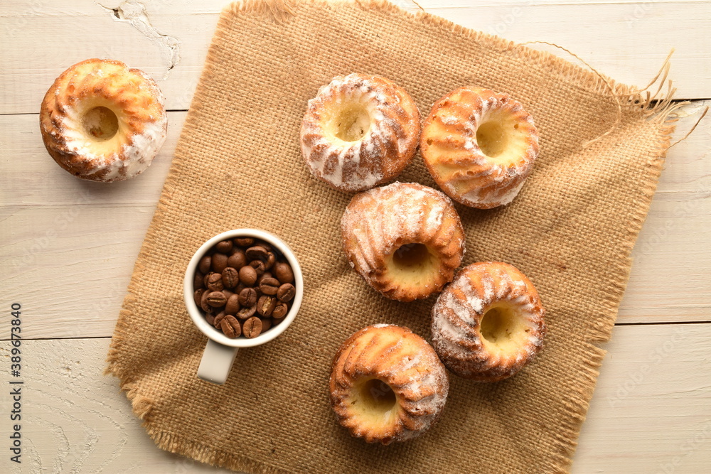Fragrant sweet cupcakes, close-up, on a jute fabric. Fragrant sweet cupcakes, close-up, on a jute fabric.