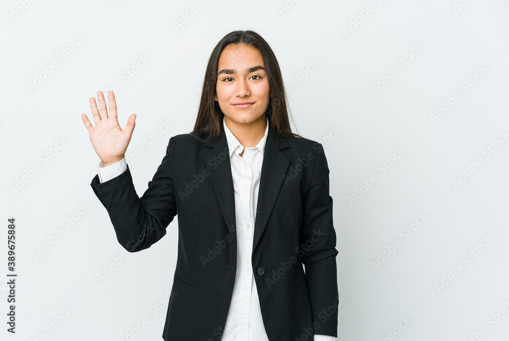 Young asian bussines woman isolated on white background smiling cheerful showing number five with fingers. Young asian bussines woman isolated on white background smiling cheerful showing number five with fingers.