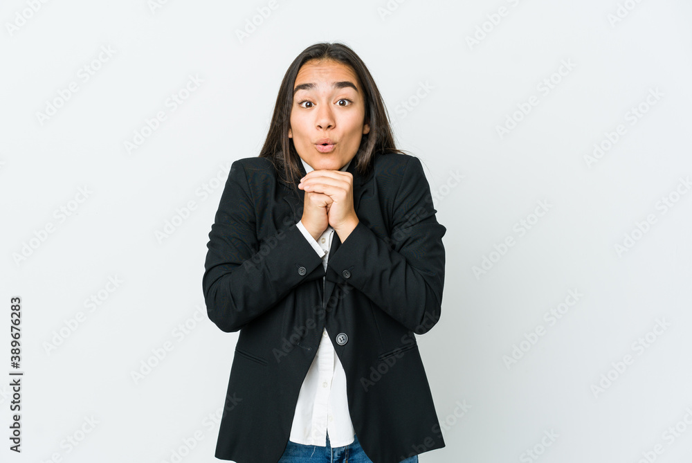 Young asian bussines woman isolated on white background praying for luck, amazed and opening mouth looking to front. Young asian bussines woman isolated on white background praying for luck, amazed and opening mouth looking to front.