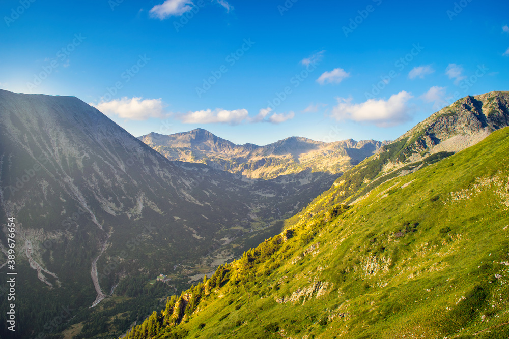Hiking to Koncheto, view across the peaks of the Pirin Mountains in Bulgaria with Vihren, Kutelo,Todorka,Banski Suhodol , National Park Pirin with company of wild goats