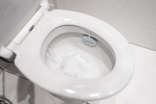 White ceramic toilet in the bathroom. Clean toilet © Kate
