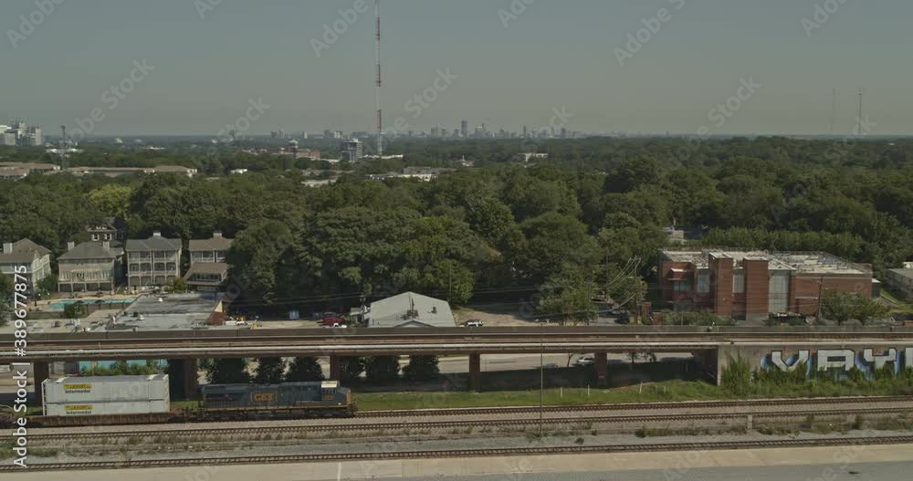 Atlanta Georgia Aerial v697 pan left shot of moving train in Inman Park neighborhood - DJI Inspire 2, X7, 6k - August 2020 Atlanta Georgia Aerial v697 pan left shot of moving train in Inman Park neighborhood - DJI Inspire 2, X7, 6k - August 2020