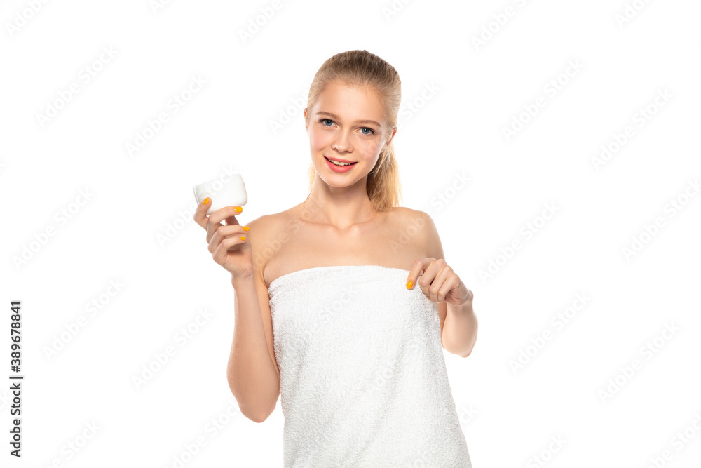 Moisturizer. Beautiful female model isolated on white background. Beauty, cosmetics, spa, depilation, diet and treatment, fitness concept. Fit and sportive, sensual body with well-kept skin in towel. Moisturizer. Beautiful female model isolated on white background. Beauty, cosmetics, spa, depilation, diet and treatment, fitness concept. Fit and sportive, sensual body with well-kept skin in towel.