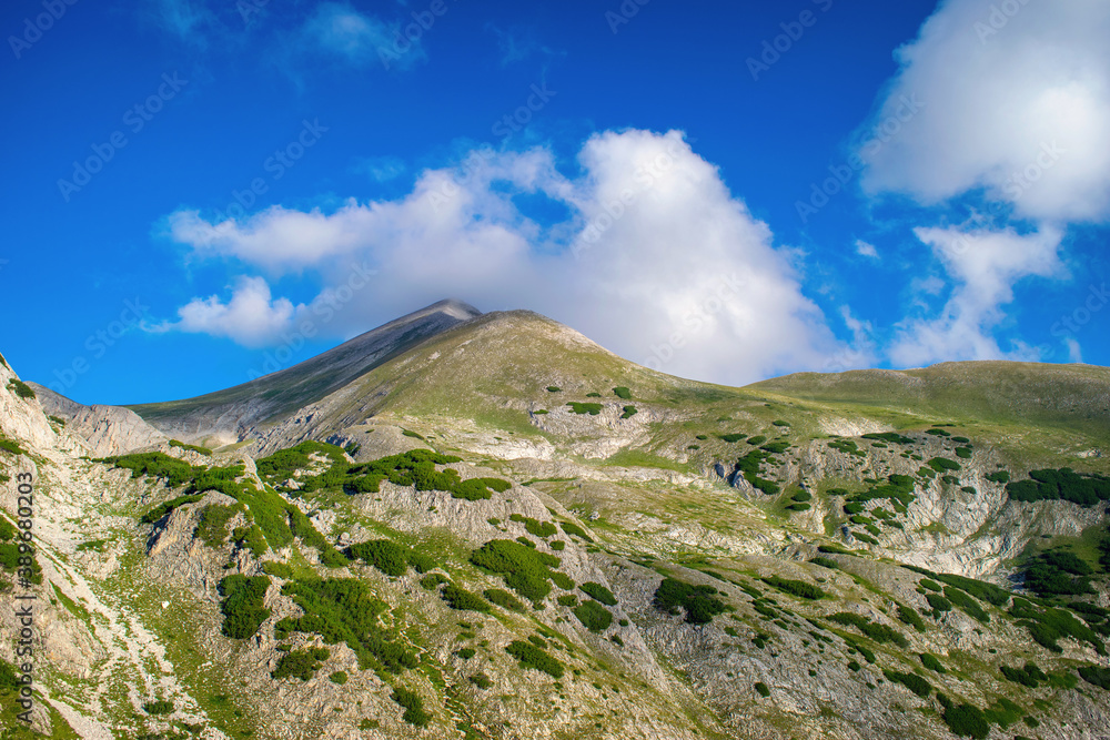 Hiking to Koncheto, view across the peaks of the Pirin Mountains in Bulgaria with Vihren, Kutelo,Todorka,Banski Suhodol , National Park Pirin with company of wild goats Hiking to Koncheto, view across the peaks of the Pirin Mountains in Bulgaria with Vihren, Kutelo,Todorka,Banski Suhodol , National Park Pirin with company of wild goats