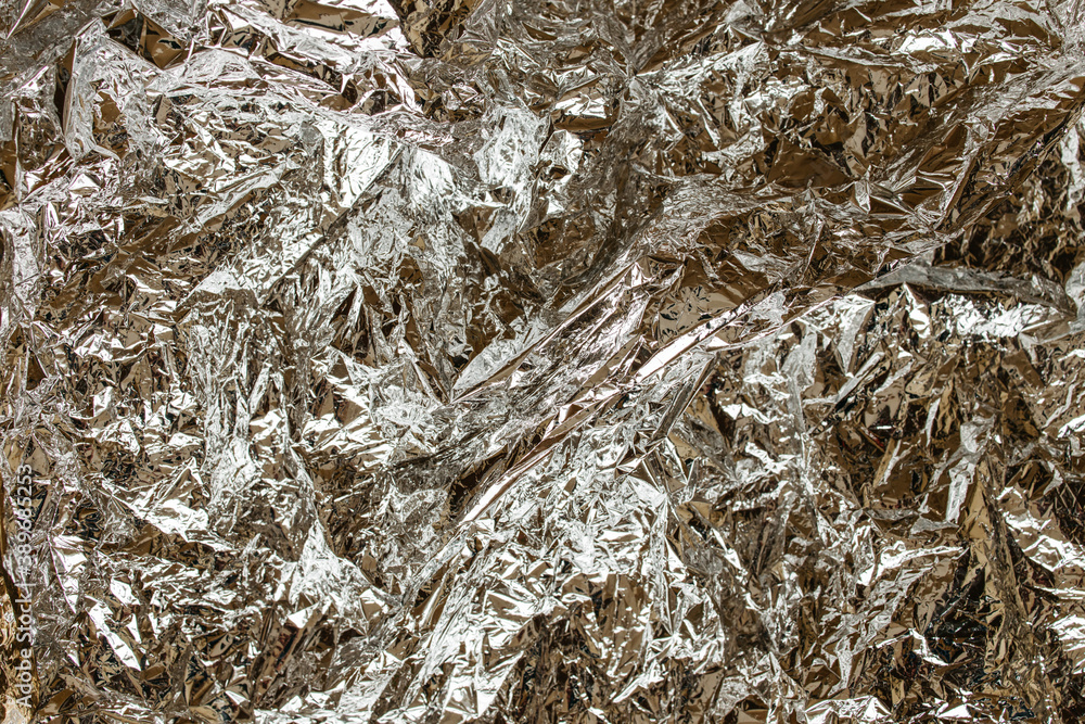 shiny silver crumpled foil grunge texture shiny silver crumpled foil grunge texture