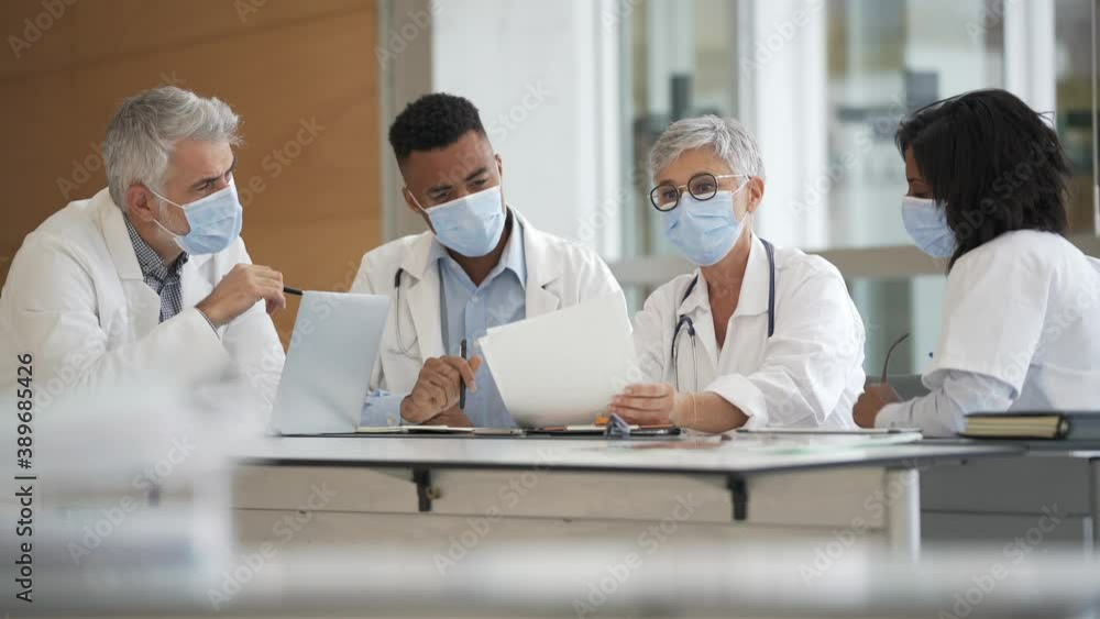 Medical staff meeting at the hospital during pandemic