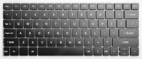 Simple computer keyboard full frame. Dark keys in a white case.