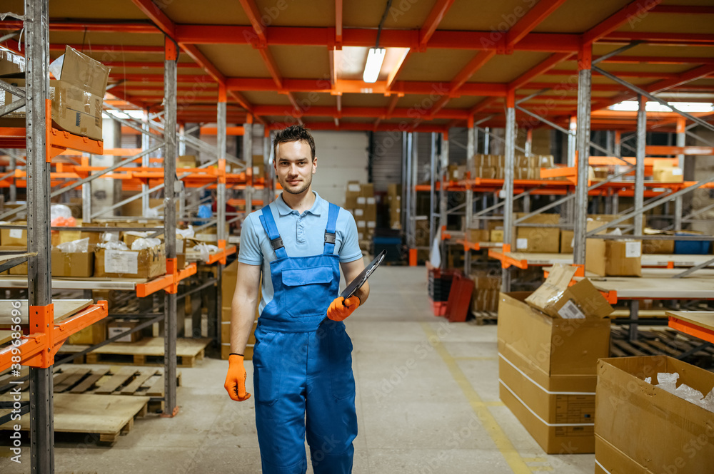 Bicycle factory, worker near the shelf, warehouse Bicycle factory, worker near the shelf, warehouse