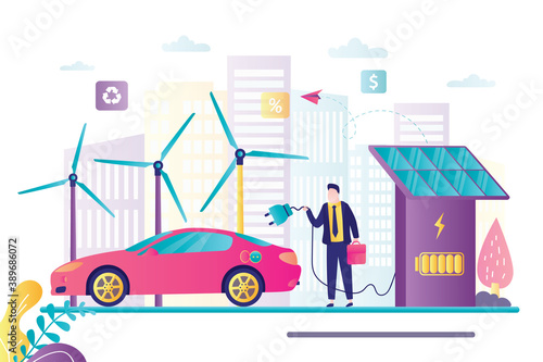 Male driver charges electric car. Charging station with solar panels. Wind turbines and city buildings on background.