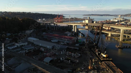 Aerial / drone footage of West Seattle, the West Seattle bridge, Harbor Island, Duwamish Waterway, Seattle Harbor terminals, Industrial District West, Elliott Bay in Seattle, King County, Washington photo