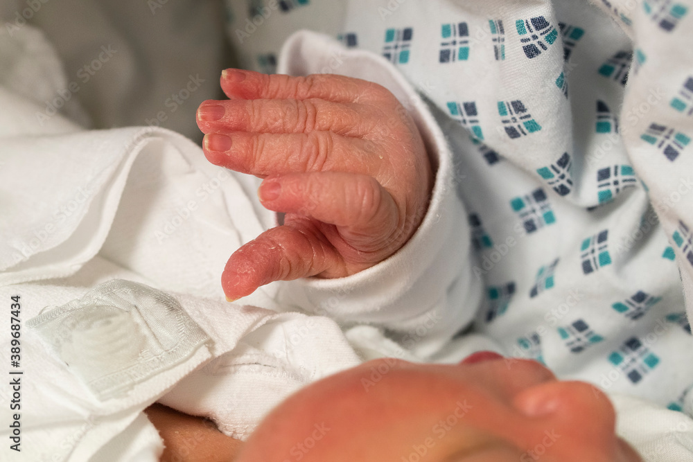 Fototapeta premium Detail of nails and fingers of a newborn.