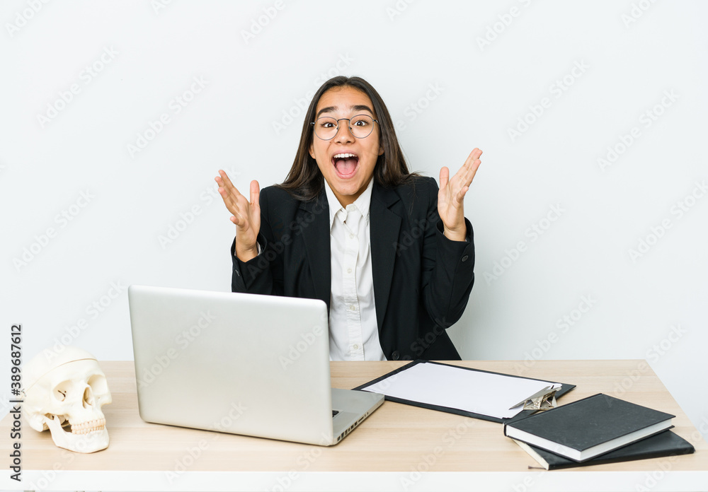 Young traumatologist asian woman isolated on white background celebrating a victory or success, he is surprised and shocked. Young traumatologist asian woman isolated on white background celebrating a victory or success, he is surprised and shocked.