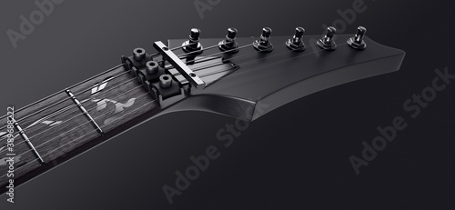Fotografie Close-up of the top of an electric guitar. Dark background.