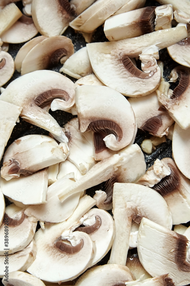 Fresh sliced white mushrooms background Fresh sliced white mushrooms background