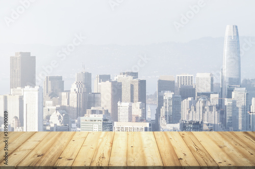 Wooden table top with beautiful San Francisco skyline on background, mockup © Pixels Hunter