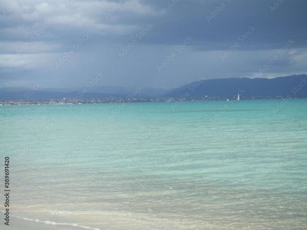 Storm rolling in over Spiaggia del Poetto, Cagliari, Sardinia