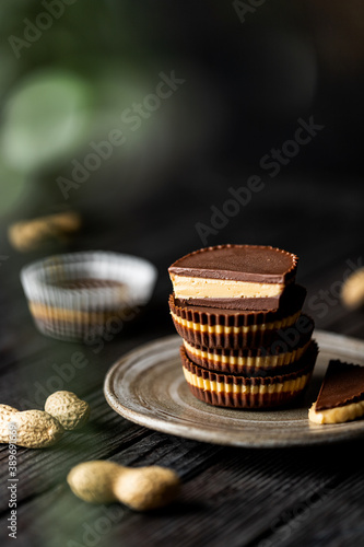 Healthy peanut butter cups tower moody food photography