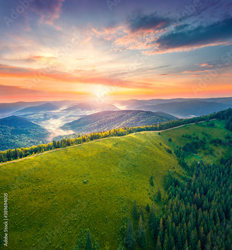 Picturesque sunrise on Lisniv ridge. Colorful summer view of Carpathian mountains, Ukraine, Europe. Beauty of nature concept background.
