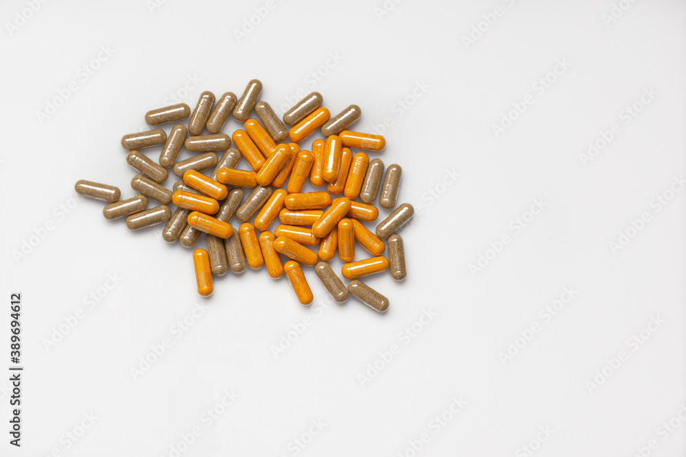 vitamins pills on clean white surface vitamins pills on clean white surface
