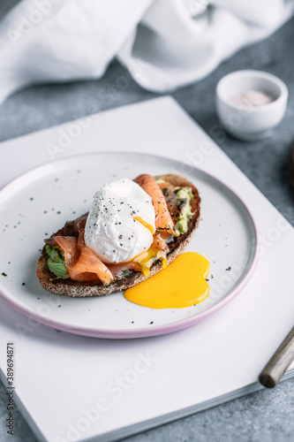 Fresh sandwich with smoked salmon poached egg and avocado  © Natalie