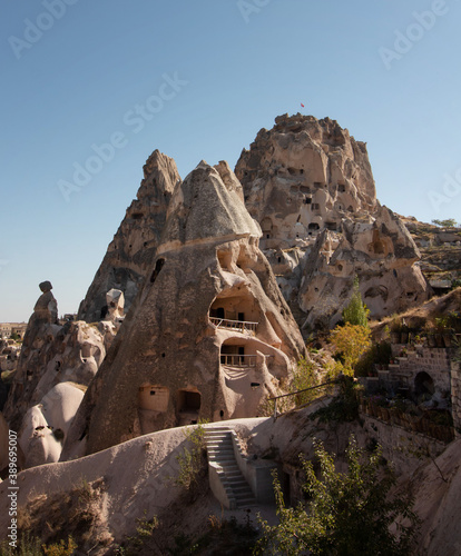 View of the rock fortress Ortahisar and houses in the rocks